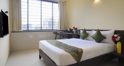 Treebo Balaji Residency, Kolhapur Room Type - Deluxe Family Room