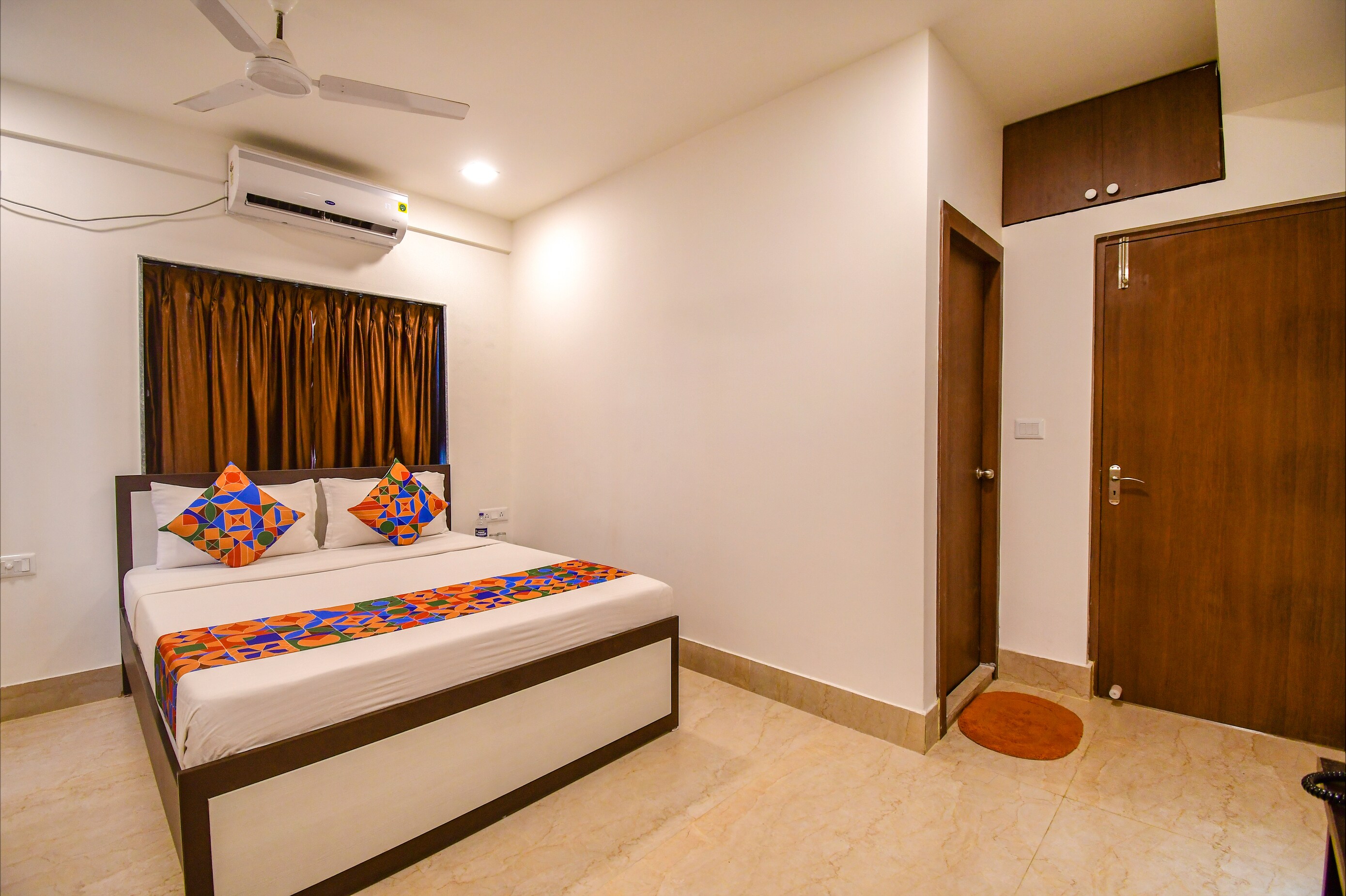FabHotel Moubani Residency - Tap to explore photos