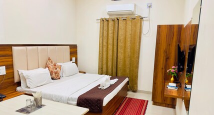 Mithilesh Hotel Room Type - Deluxe Room