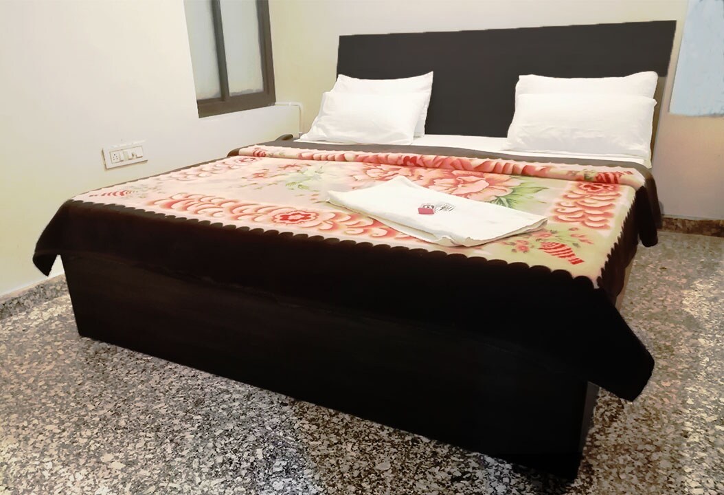 Hotel Gulmohar - Tap to explore photos