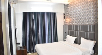 Hotel Nisarg Loding Room Type - Deluxe AC