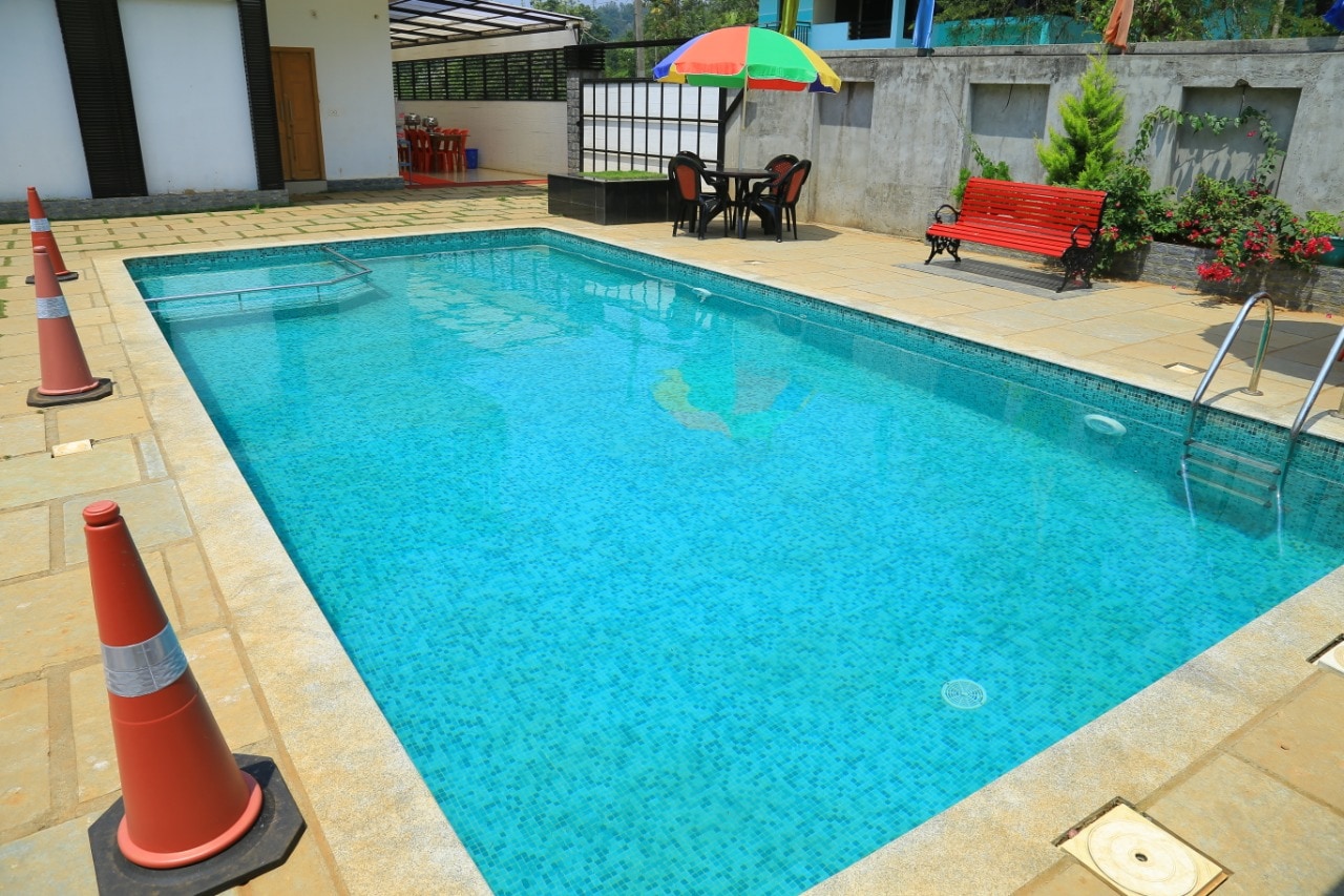 Vythiri Hills Holiday Homes | Rooms & Pool - Tap to explore photos