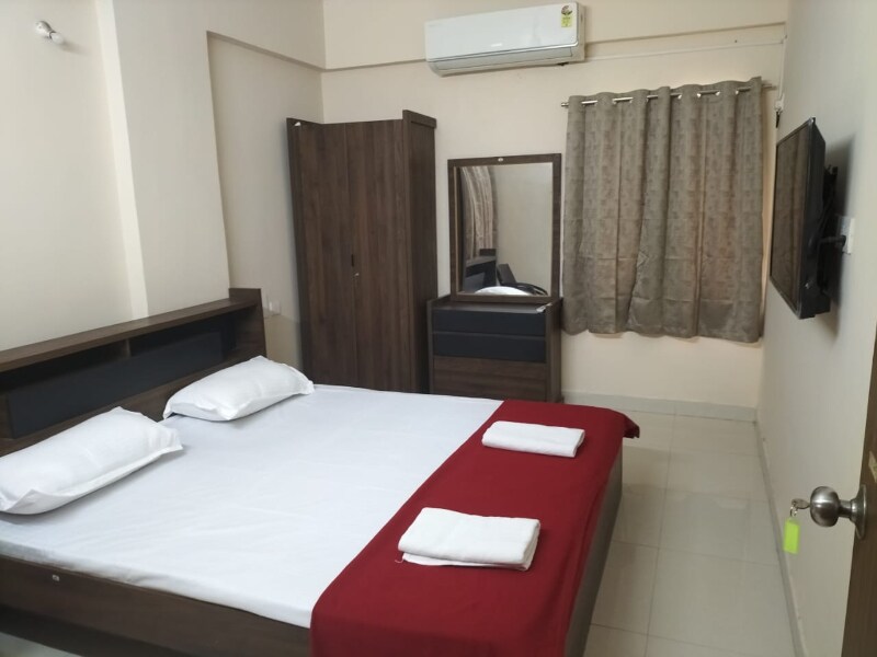 Aakruthi Inn Service Apartment - Tap to explore photos