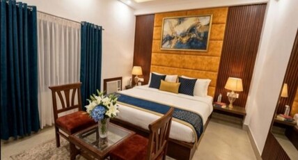 shree ji hotel park roots Room Type - Deluxe Room with Garden View