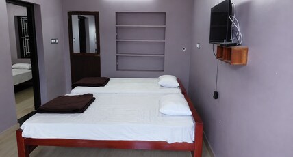 HOTEL SABAREESH Room Type - 4 Bed Deluxe Family Room AC