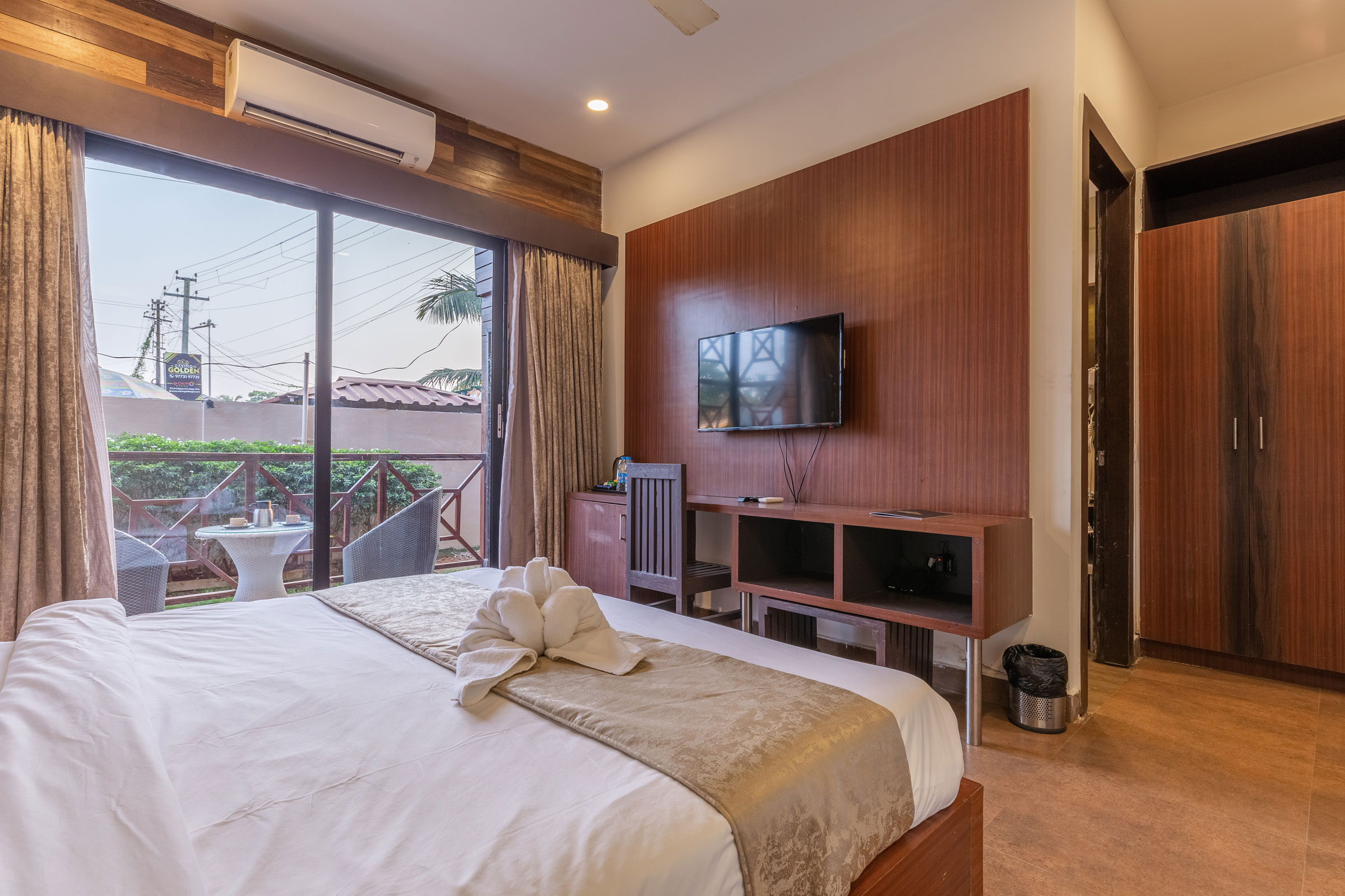 Amara Oceanfront Resort & Club Baga - Tap to explore photos