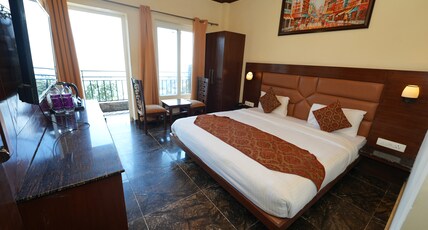 DALLAS EXPRESS HOTEL ( MUSSOORIE ) Room Type - Super Deluxe room with balcony