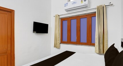 Hotel O Ujjawal Bhawan Formerly Anmol Residency Room Type - Saver Double Hotel O Ujjawal Bhawan Formerly Anmol Residency Room Type - Saver Double