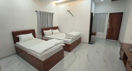 Hotel Deep Nisha Room Type - Deluxe Triple Room ( 1 Double Bed + 1 Single Bed | 3 Pax )