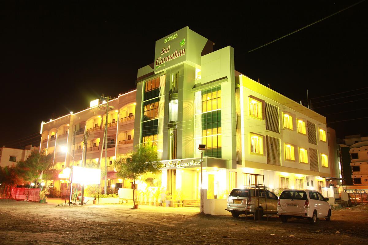 Hotel Sai Gurusthan - Tap to explore photos