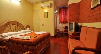 White orchid hotel Room Type - Deluxe AC