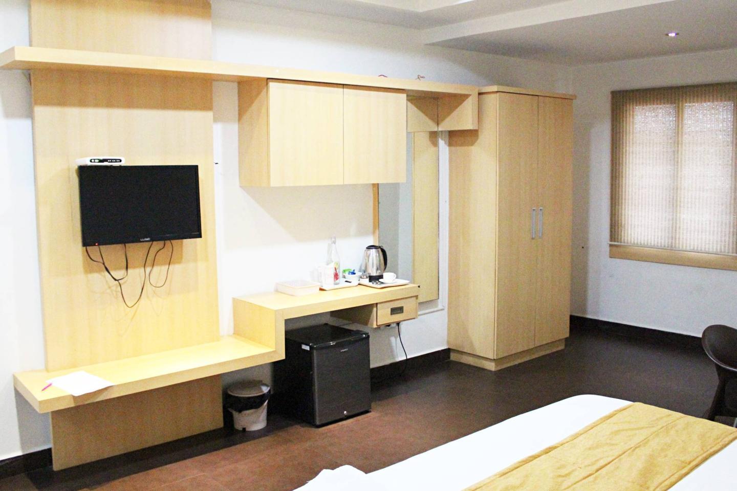 Siri Varshini Inn - Tap to explore photos