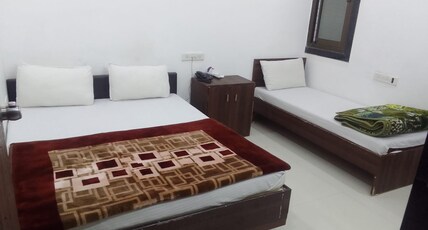 Hotel Minaxi Inn Room Type - Super Deluxe Triple Bed Room