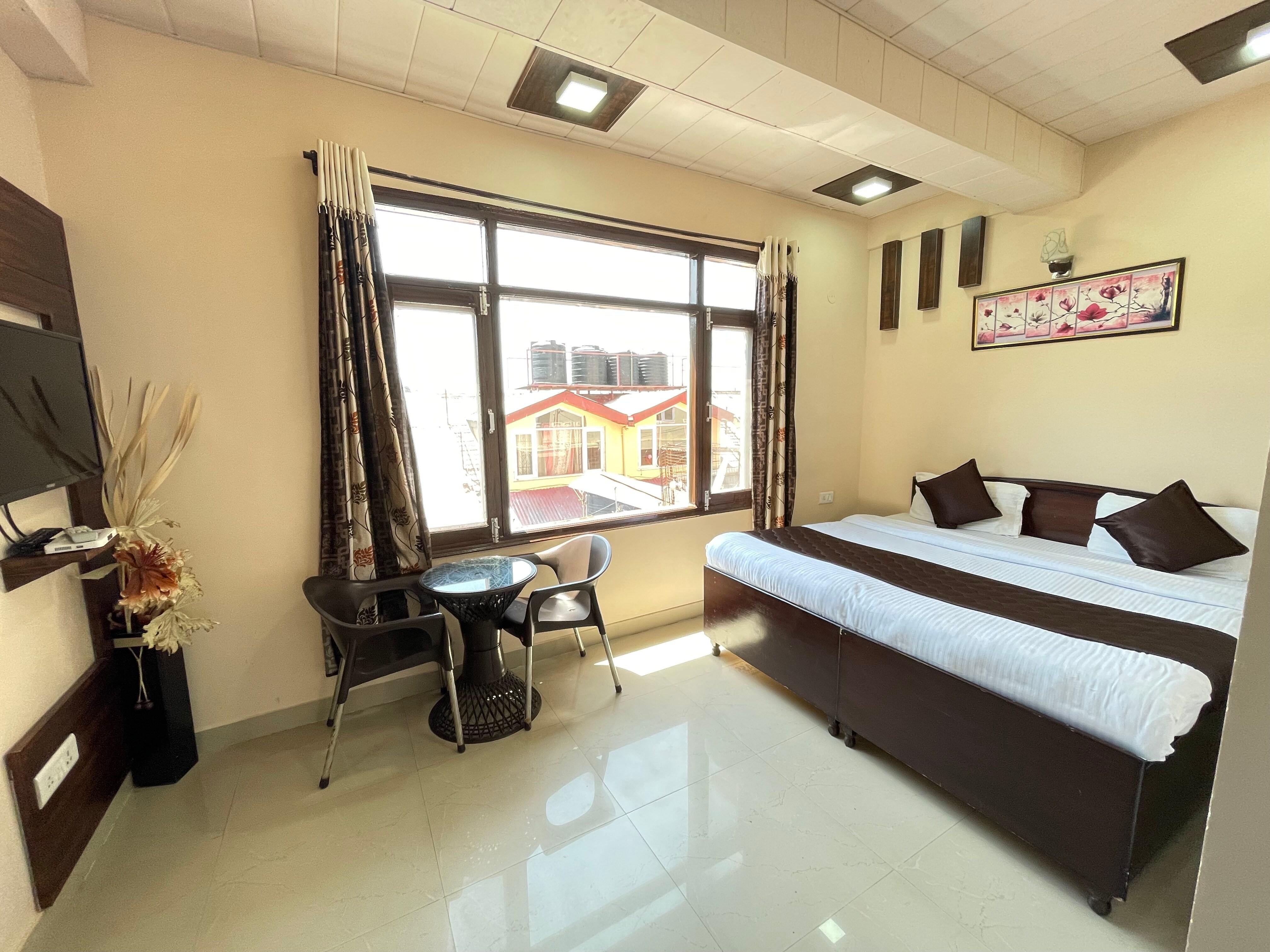 Hotel O Home Sam Villa Studio - Tap to explore photos