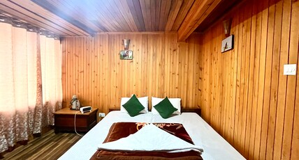 Phamlhakhang Eco Homestay Room Type - Double Bedded Room ( scenic  mountain view with a private balcony)