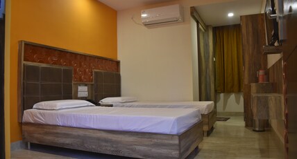 HOTEL ILAPURAM SMART Room Type - single deluxe room