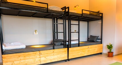 Aavaas Farm Hostel Room Type - 8 Bed Mix Dorm - Premium Room with Dam View