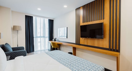 Best Western Plus Batumi Room Type - 1 King 1 Queen, Non-Smoking, Family Room, Separate Living Room, Kitchenette, Air-Conditioned, Bathtu Best Western Plus Batumi Room Type - 1 King 1 Queen, Non-Smoking, Family Room, Separate Living Room, Kitchenette, Air-Conditioned, Bathtu