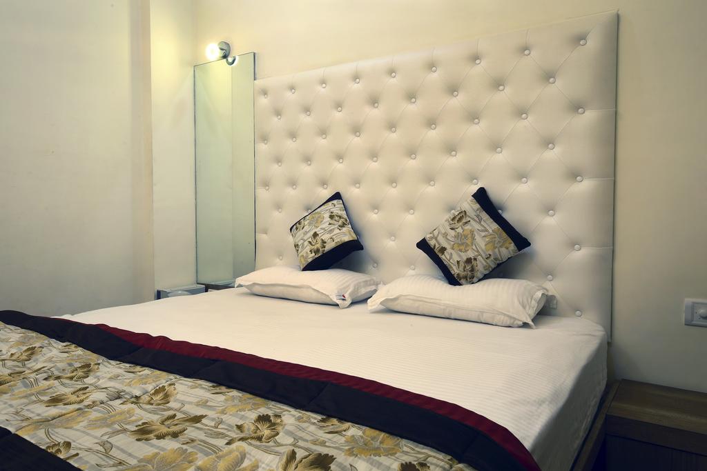 Hotel Girija - Tap to explore photos