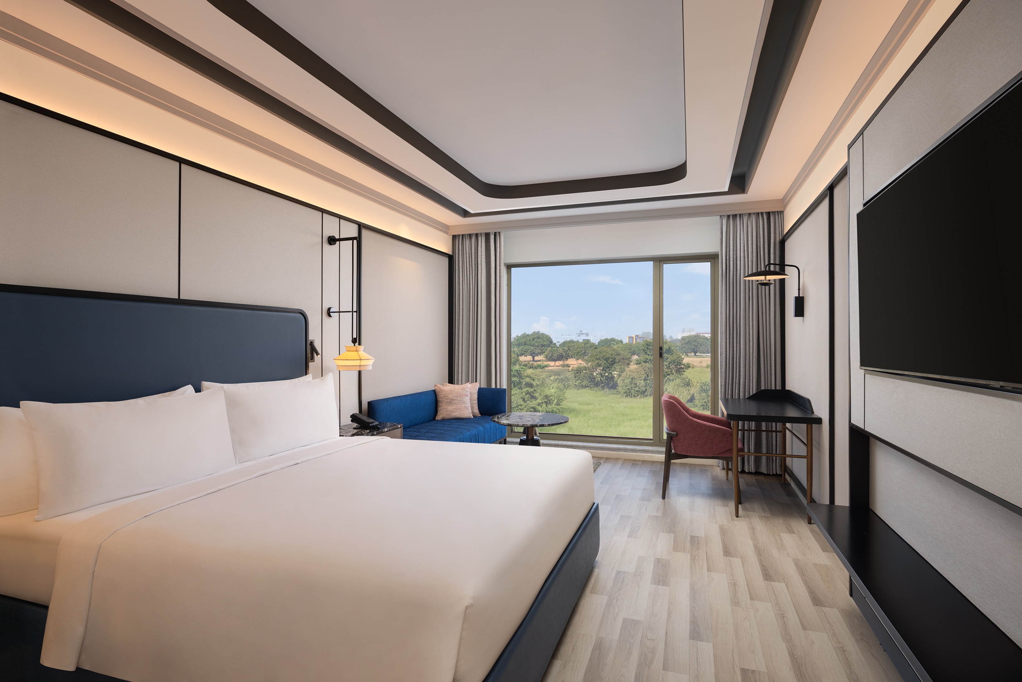 DoubleTree by Hilton Bengaluru Airport - Tap to explore photos