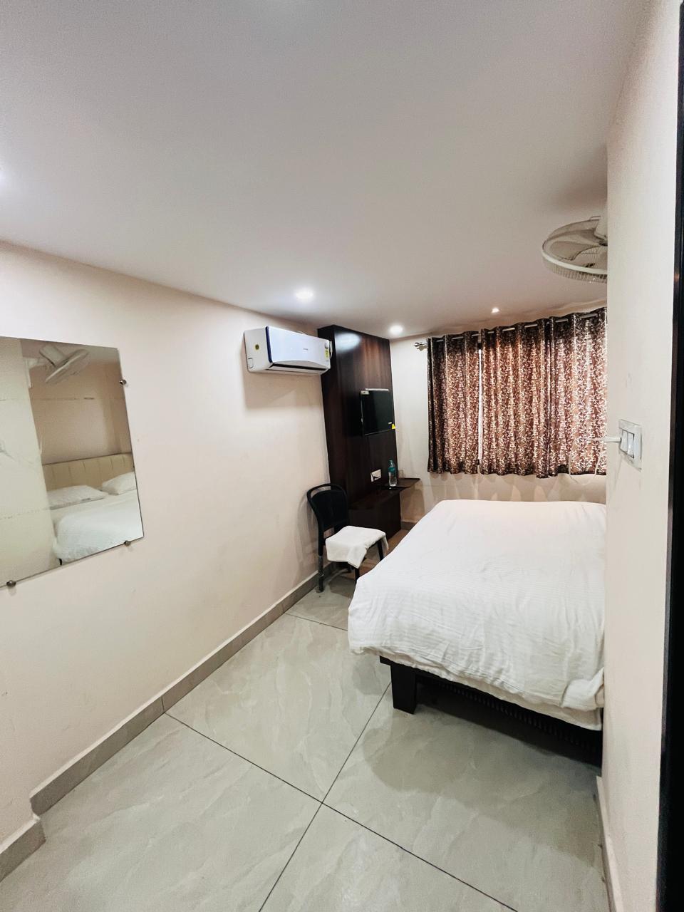 Hotel Om Omkar - Tap to explore photos