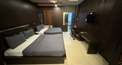 Hotel Trishul By T And M Hotels Room Type - DELUXE FOUR BED AC ROOM