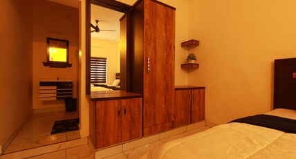 SR Meridian | Near Padmanabhaswami temple Room Type - Double Bedroom