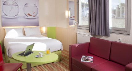 ibis Styles Paris Roissy CDG Room Type - Standard Family Suite with a double bed and twin beds