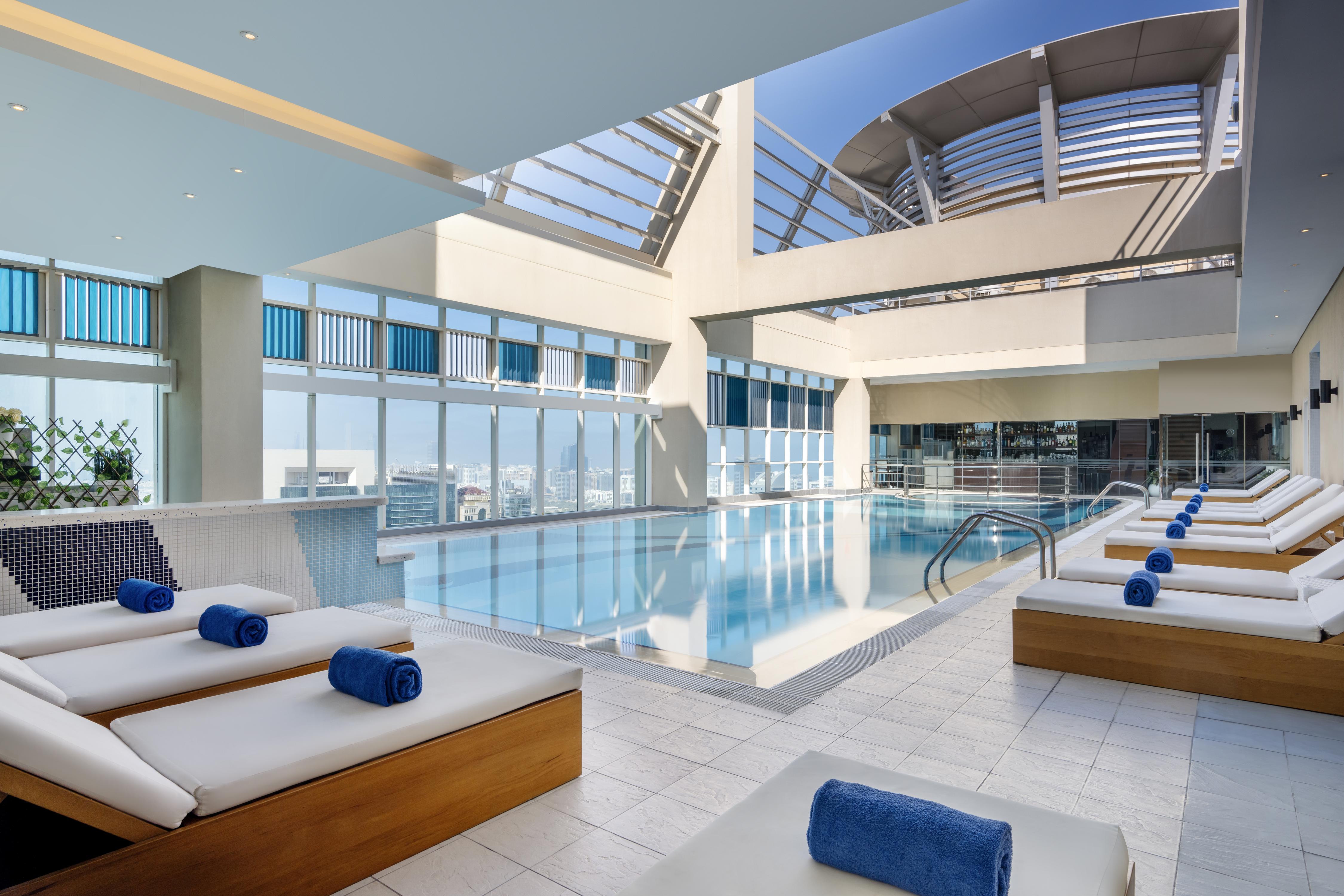 Grand Millennium Al Wahda Hotel and Executive Apartments Abu Dhabi - Tap to explore photos