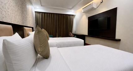 Hotel Mango Groves Room Type - Premium Twin Bed Room