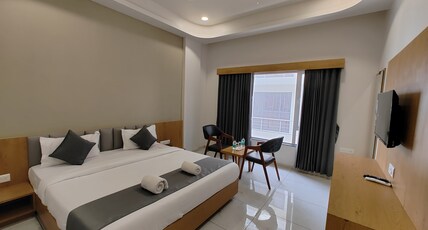 Hotel Amrut Inn Hospitalities Room Type - Deluxe Double Bed Hotel Amrut Inn Hospitalities Room Type - Deluxe Double Bed