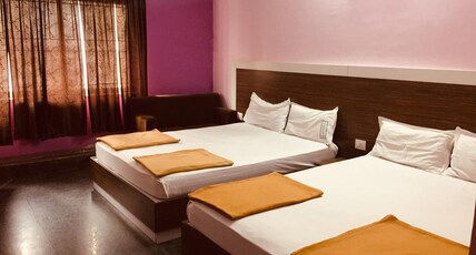 Sapphire Inn Room Type - Deluxe Quadruple Room with AC