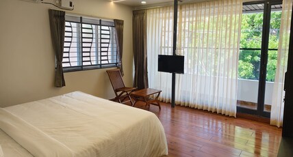 VELMORA LUXE RESIDENCES. Room Type - Deluxe Room with Balcony