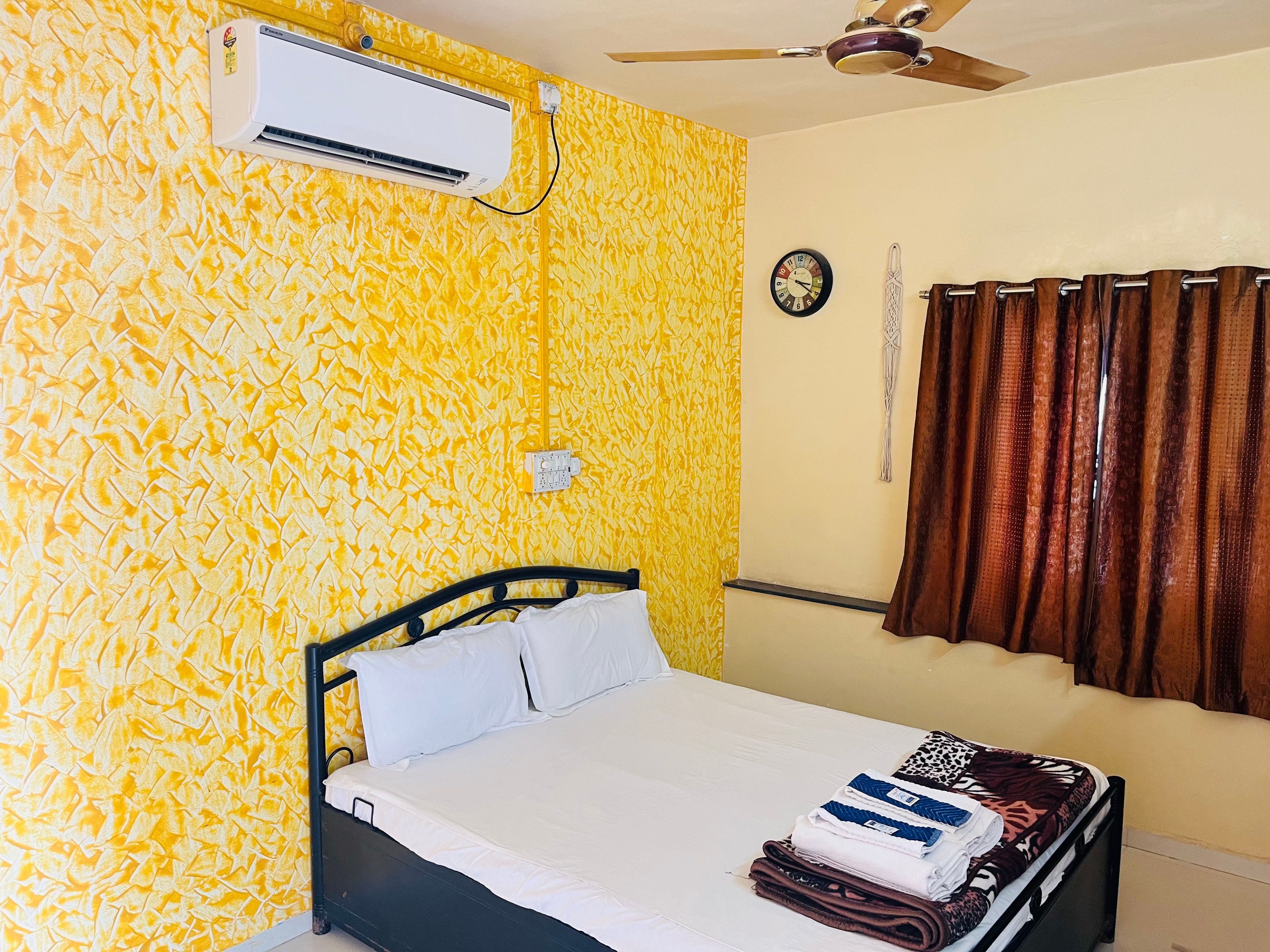 Home Stay Room with AC - Tap to explore photos