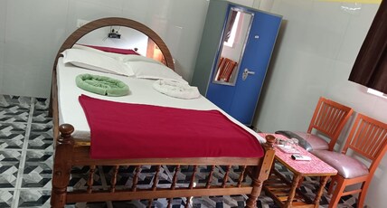 Kubera Rooms and restaurant Room Type - Deluxe Room AC