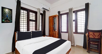 Hotel O West Hill near Mietra Hospital Room Type - Classic Hotel O West Hill near Mietra Hospital Room Type - Classic
