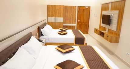 SATVI INN Room Type - Delux room with 2 number king size beds air conditioned SATVI INN Room Type - Delux room with 2 number king size beds air conditioned