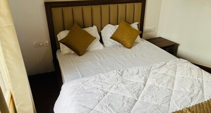 Simran Aura Room Type - Deluxe Room