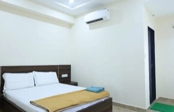Poojitha grand Room Type - TNR LUXURY ROOMS