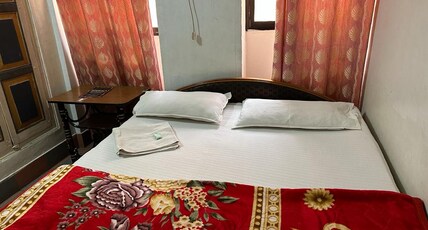 Ganga Fuji Homes And Hostel @Dashashwamedh Ghat Room Type - Standard Non AC | Attached Washroom