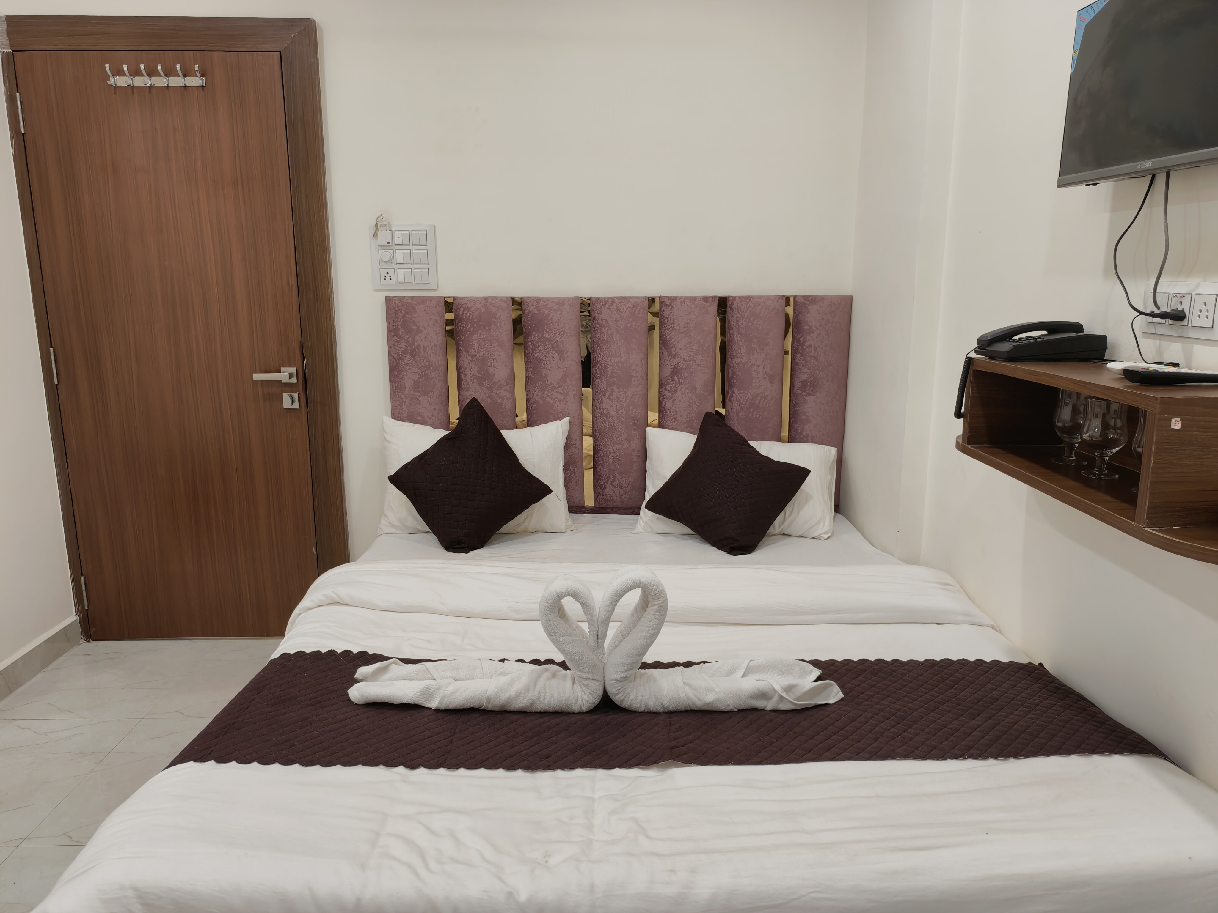 Hotel Tatvam Stays - Tap to explore photos