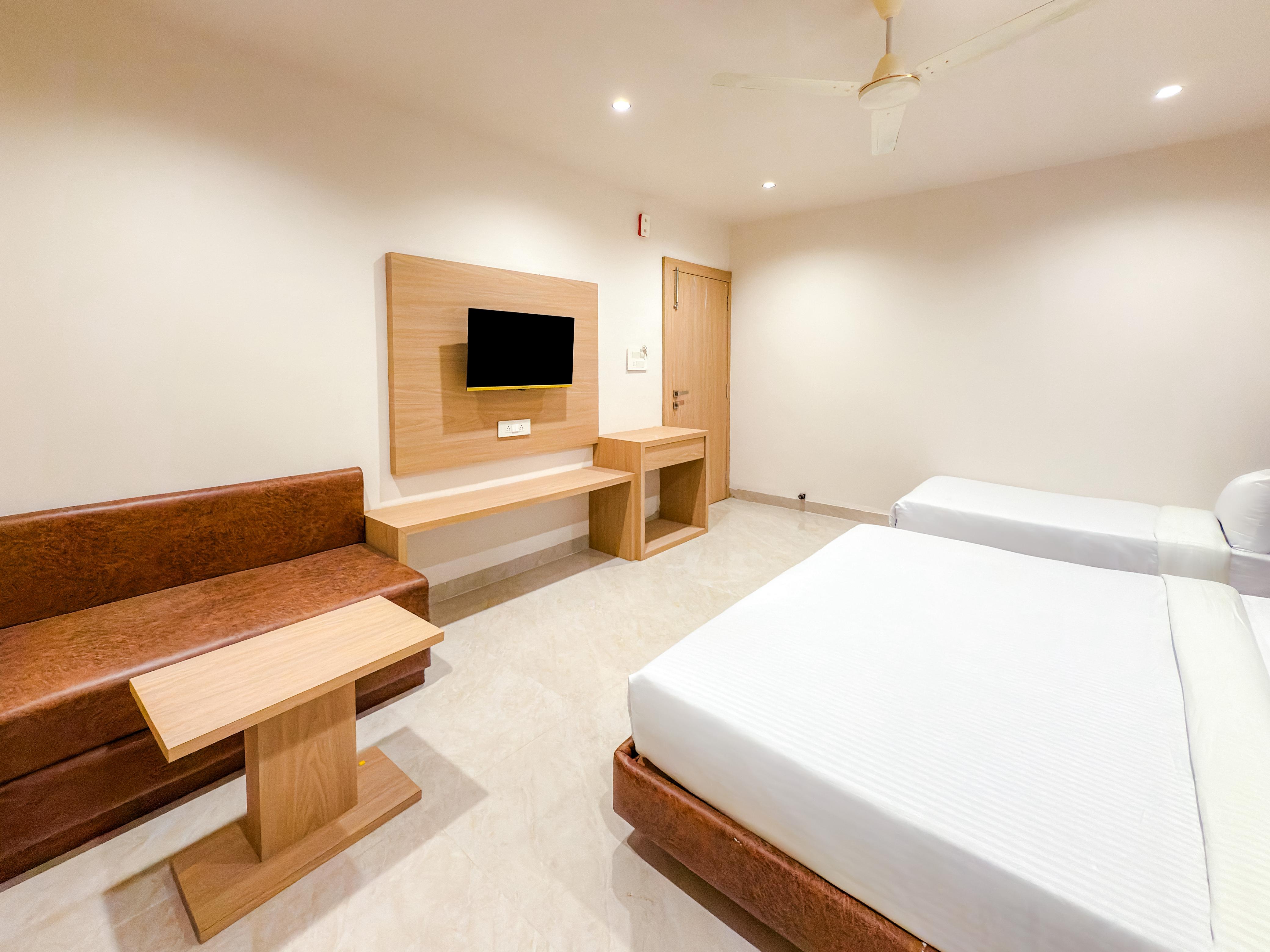 Hotel Anand - Tap to explore photos