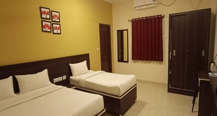 MK GRANDE HOTEL Room Type - AC Deluxe Rooms