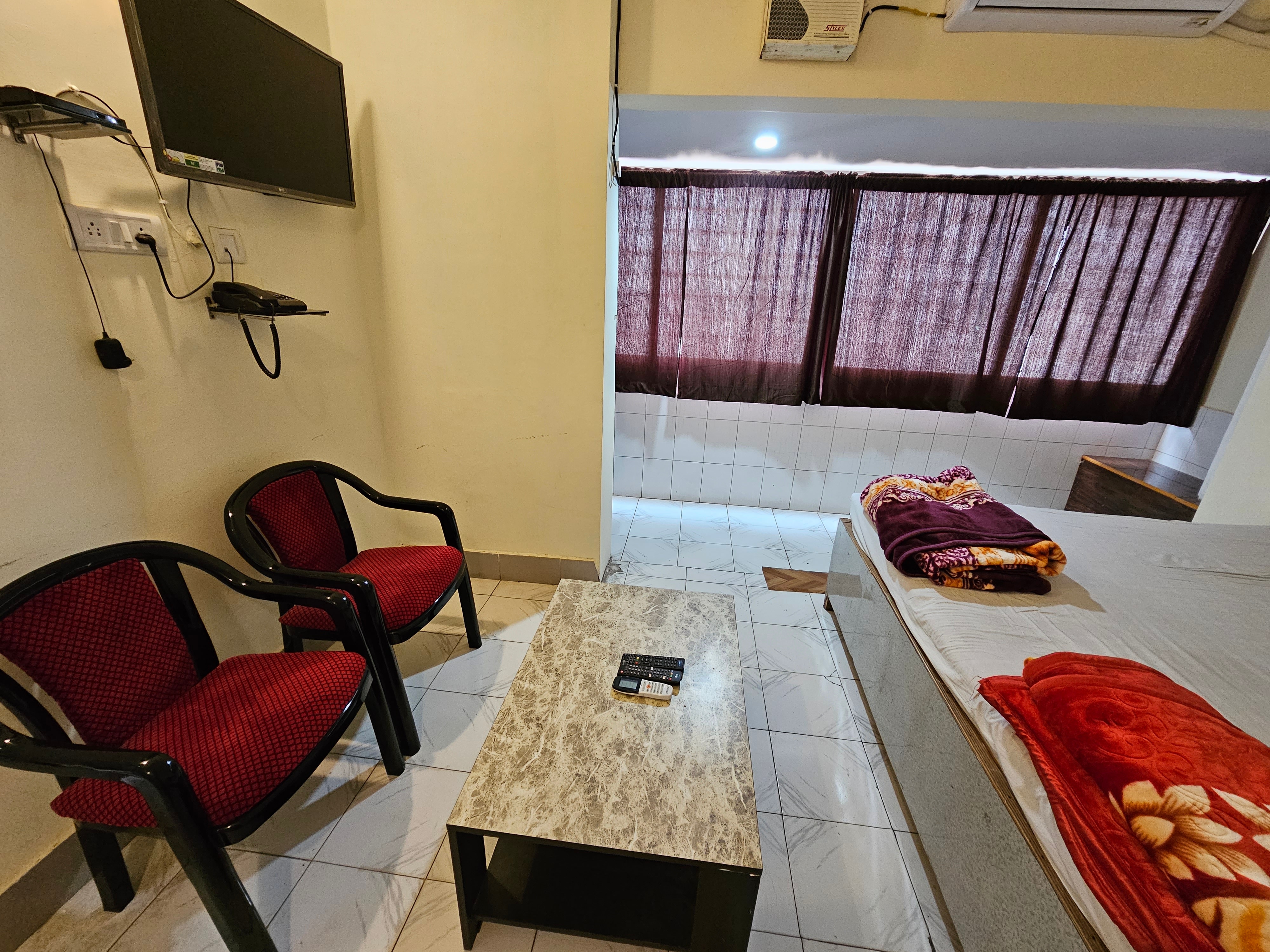 Hotel Akash - Tap to explore photos