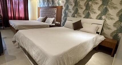 Petal Hotels (50 mtrs from Sea beach) Room Type - Family Room, Connected with Open Terrace , Sea View