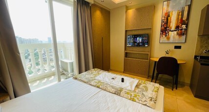Beige House 1BHKs - Meraki Stays II PKS Town Central Room Type - Elite Bnb Studio at Gaur City Centre