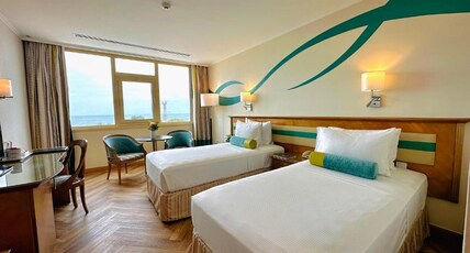 CORAL BEACH RESORT SHARJAH Room Type - Standard Twin Room with a View