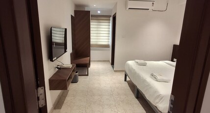 Amulya Royal Inn Room Type - Deluxe Room