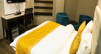 Hotel The IVY Grand with Secured Parking Room Type - Executive Room