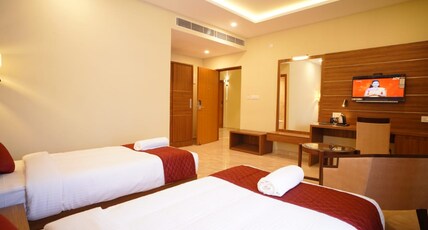 Gokulam Residency Room Type - Deluxe Room AC